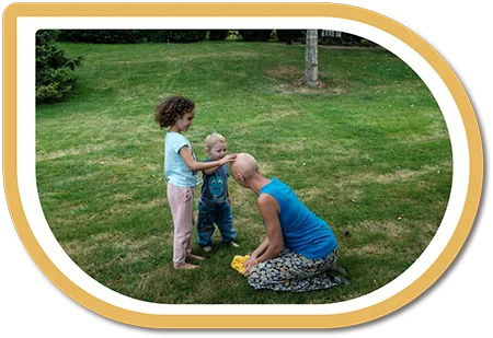 Bald girl with family