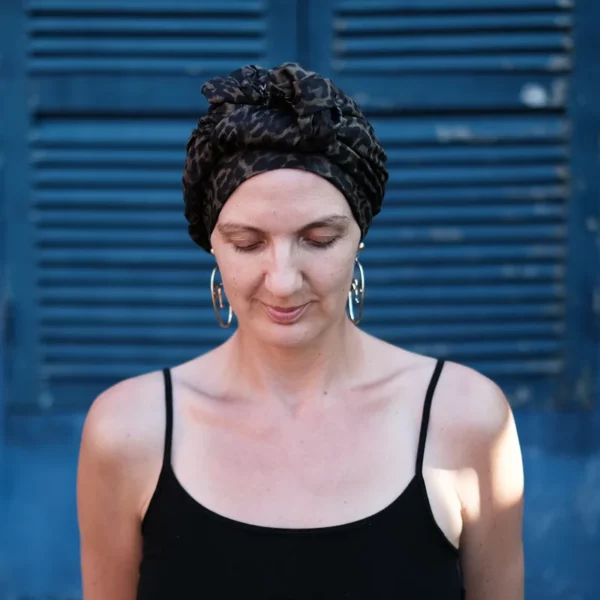 Lady Alopecia wearing Dark Leopard Linen Headscarf